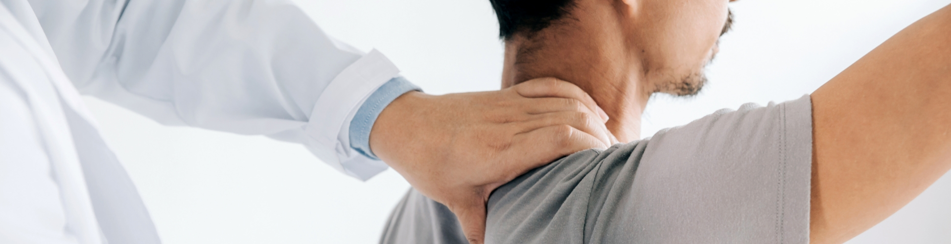 A Forward Physio doctor of physical therapy performing manual therapy on an athlete&rsquo;s neck and shoulder in Tampa