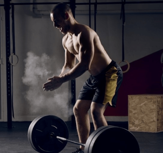 Man performing deadlift exercise